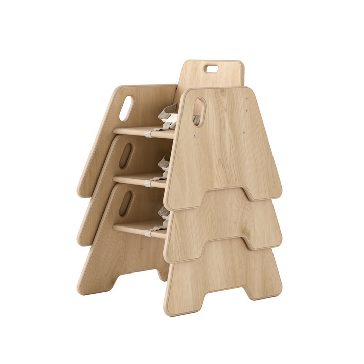 Set of three wooden stools stacked on a white background